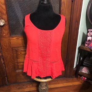 Sleeveless orange shirt